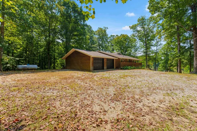 a house with trees in the background