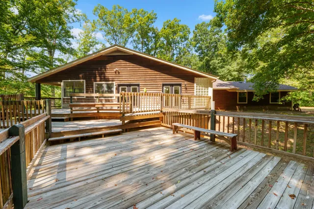 a view of a house with a roof deck