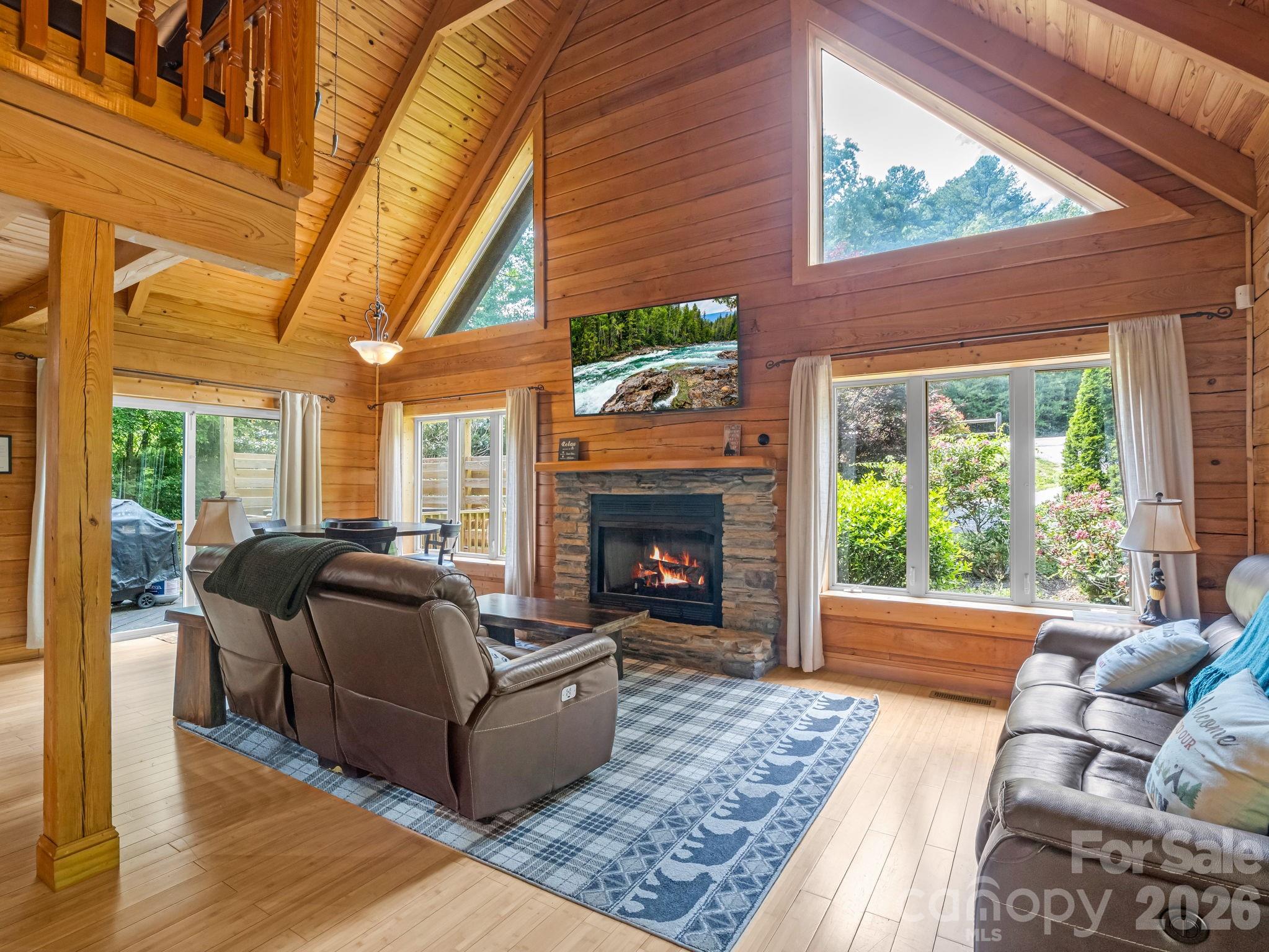 165 Dream Road Hendersonville, NC 28792 - Photo 10 of 46 a living room with furniture and a fireplace