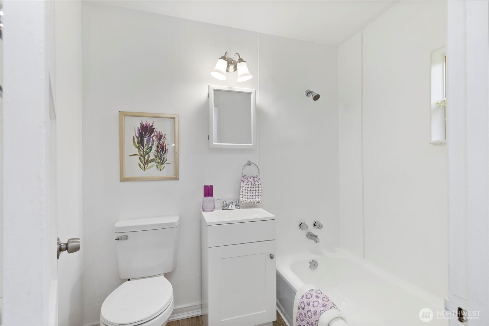 3326-3328 Halverson Avenue Bremerton, WA 98310 - Photo 12 of 36 a bathroom with a sink toilet vanity and tub
