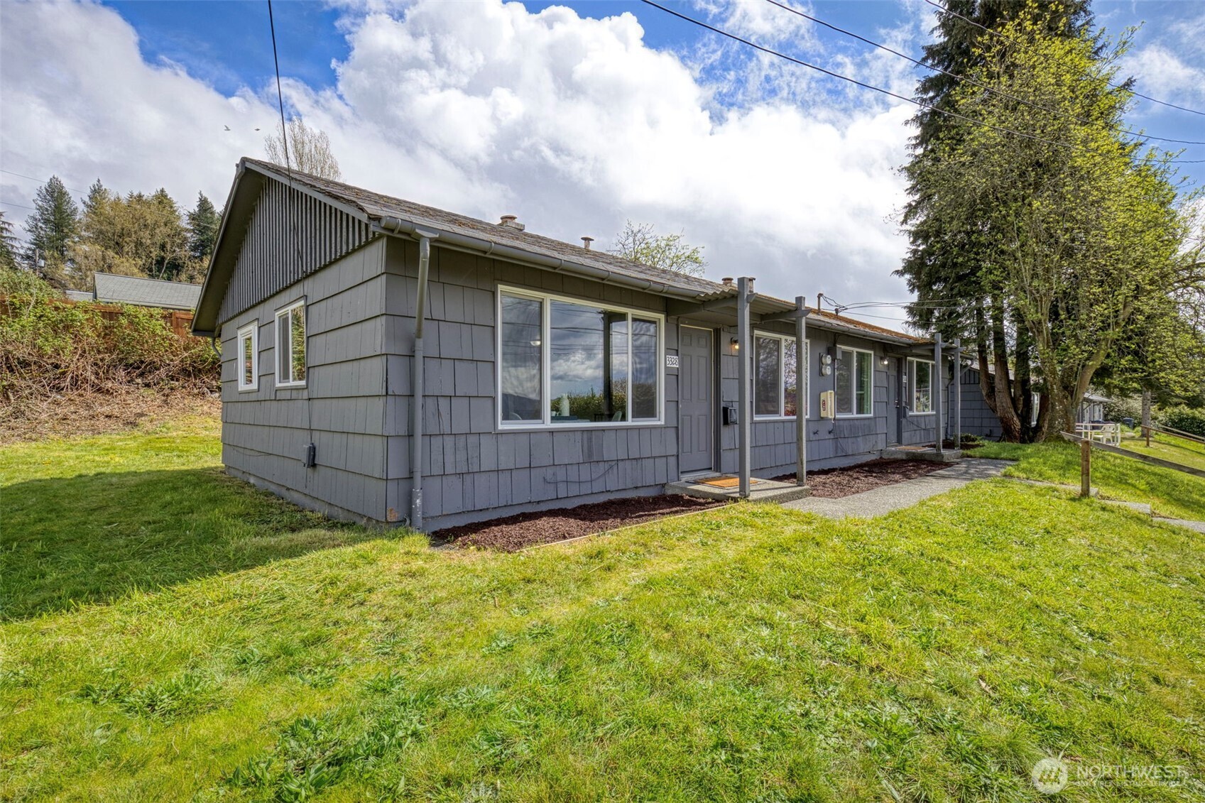 3326-3328 Halverson Avenue Bremerton, WA 98310 - Photo 13 of 36 a view of backyard with green space