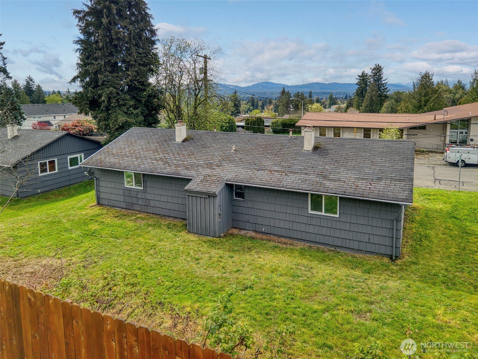 3326-3328 Halverson Avenue Bremerton, WA 98310 - Photo 14 of 36 a view of a house with a garden