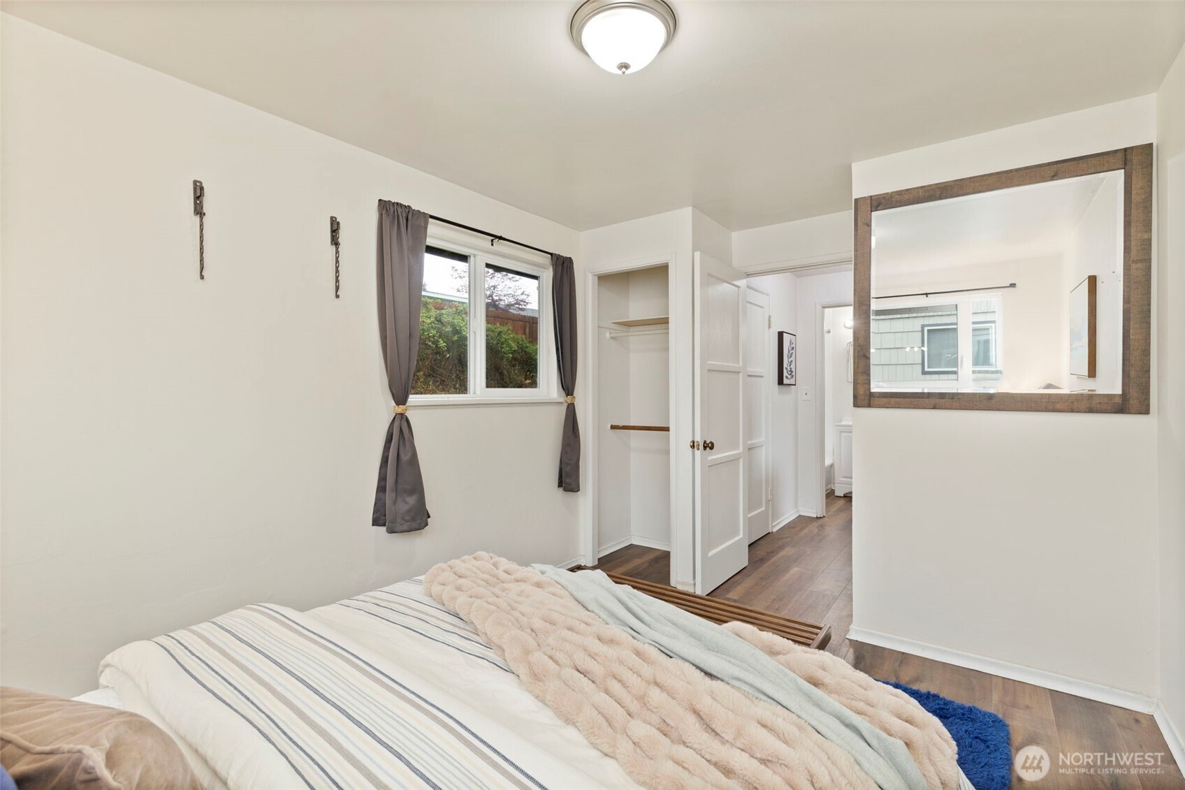 3326-3328 Halverson Avenue Bremerton, WA 98310 - Photo 24 of 36 a bedroom with a bed and a dresser