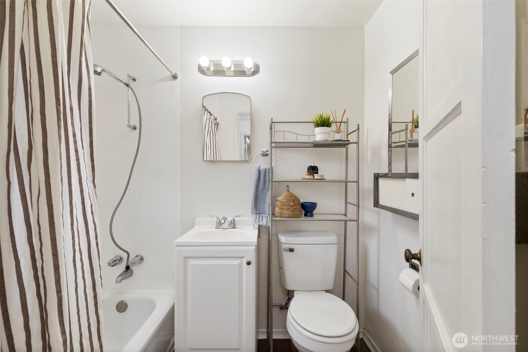 3326-3328 Halverson Avenue Bremerton, WA 98310 - Photo 26 of 36 a bathroom with a sink toilet and shower