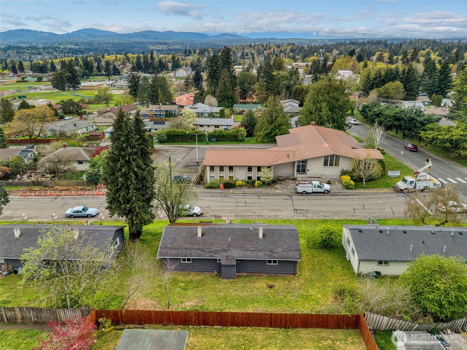 3326-3328 Halverson Avenue Bremerton, WA 98310 - Photo 31 of 36 an aerial view of a house with garden space and lake view