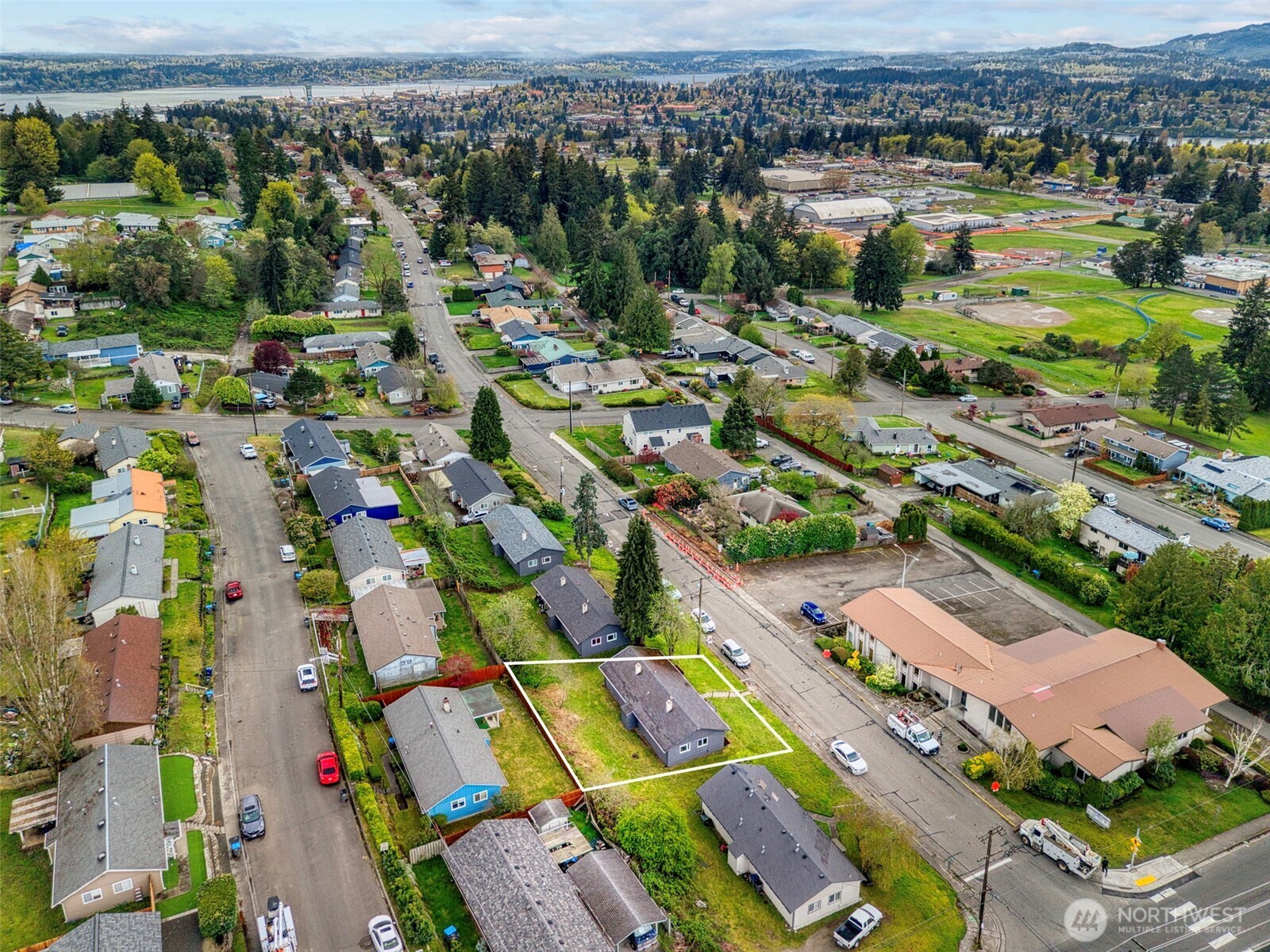 3326-3328 Halverson Avenue Bremerton, WA 98310 - Photo 32 of 36 an aerial view of residential houses with outdoor space