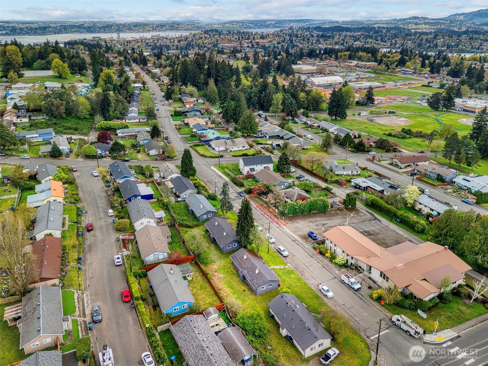 3326-3328 Halverson Avenue Bremerton, WA 98310 - Photo 34 of 36 an aerial view of residential houses with outdoor space