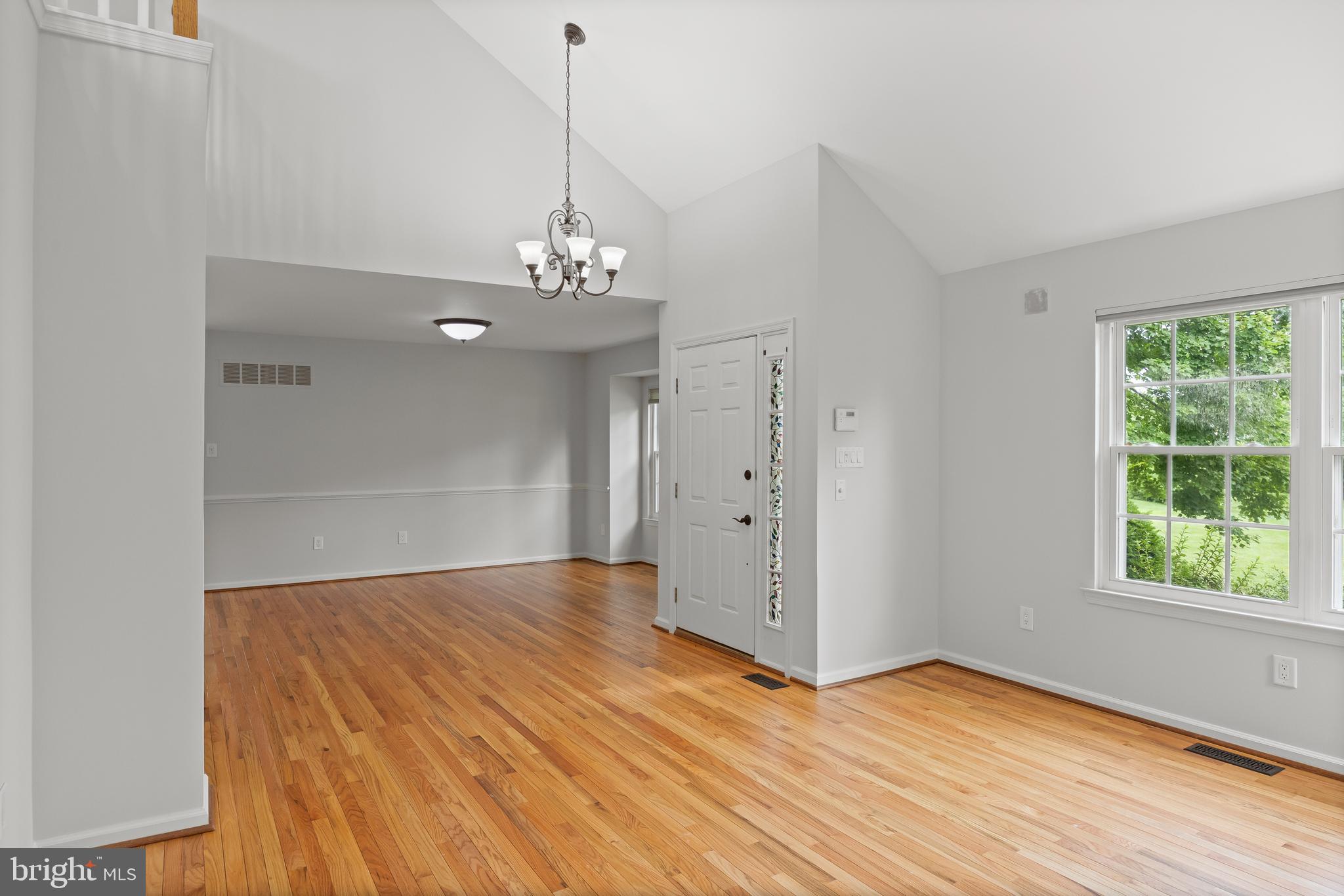 2 Hogan Way Moorestown, NJ 08057 - Photo 2 of 21 a view of an empty room with wooden floor and a window