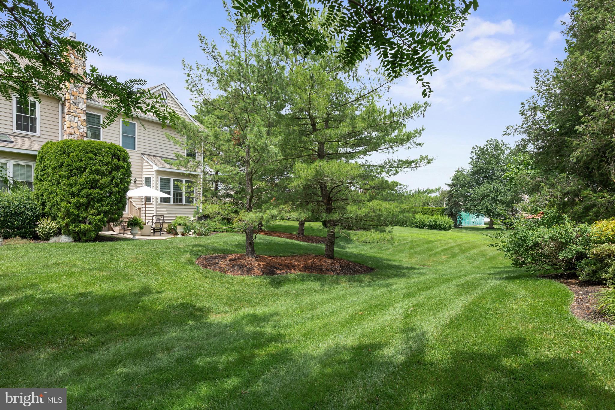 2 Hogan Way Moorestown, NJ 08057 - Photo 21 of 21 a view of a backyard with plants and a garden