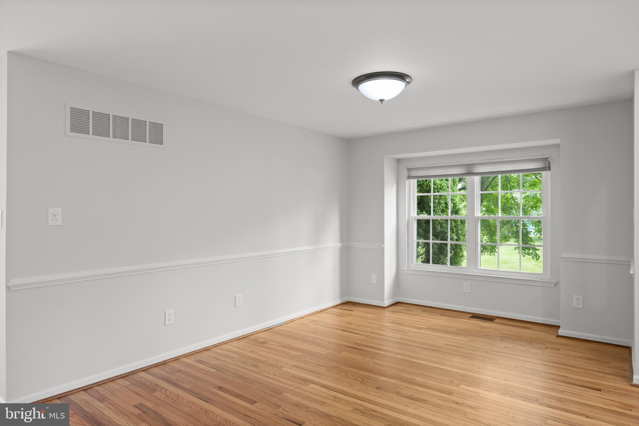2 Hogan Way Moorestown, NJ 08057 - Photo 3 of 21 an empty room with wooden floor and windows