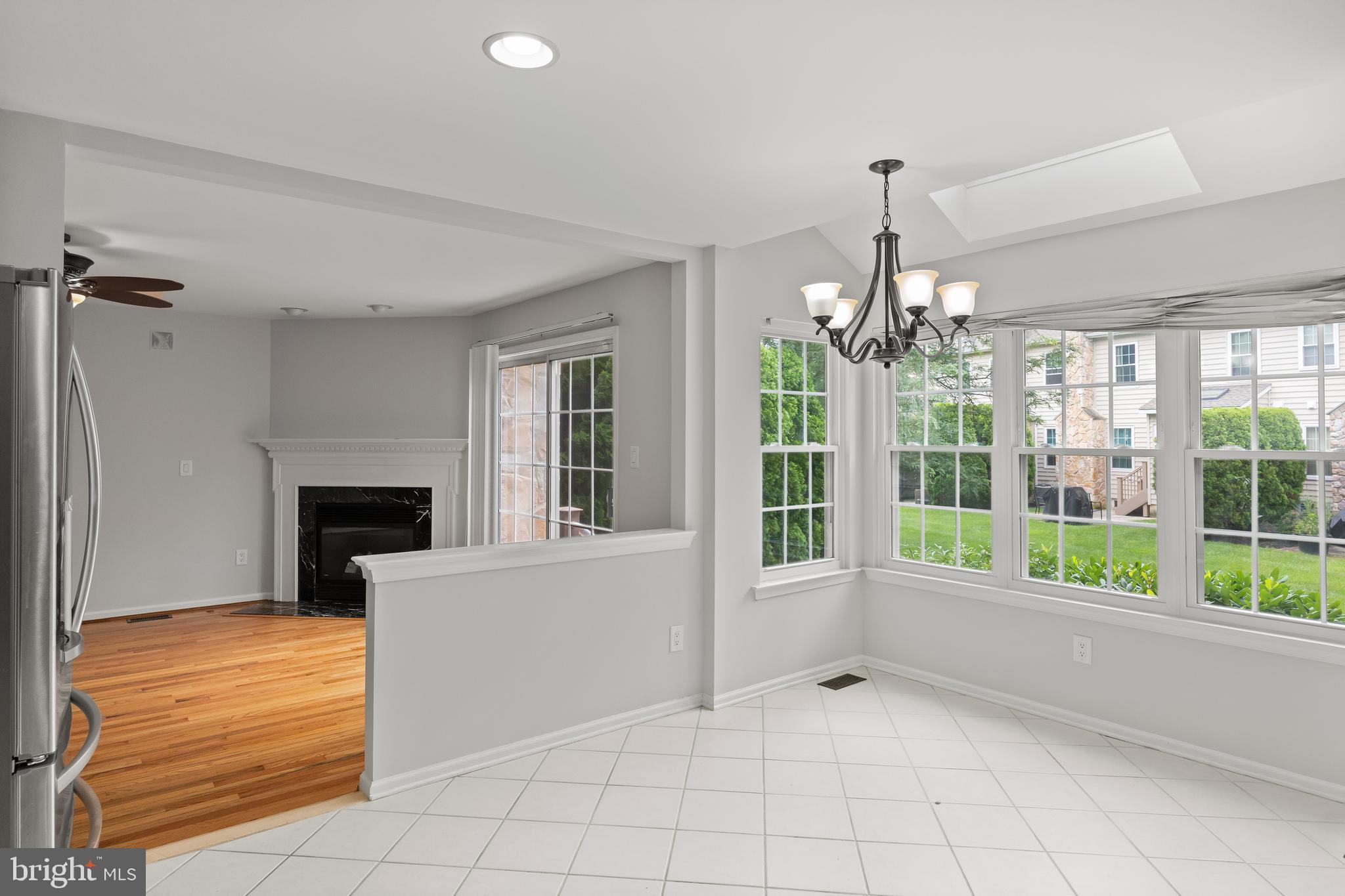 2 Hogan Way Moorestown, NJ 08057 - Photo 7 of 21 a view of an empty room with a fireplace and a chandelier