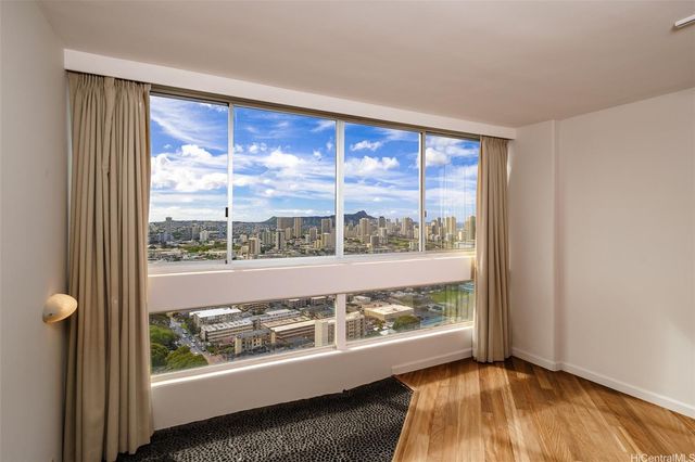 a view of a room with a large window