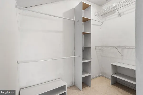 a view of an empty walk in closet