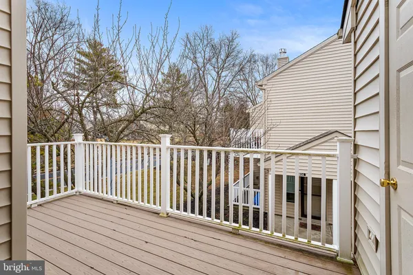 a view of a wooden roof deck