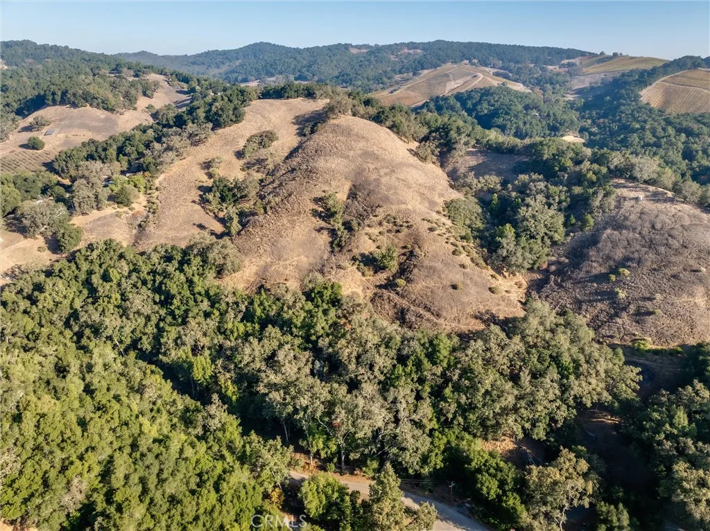0 Shadow Canyon Road Templeton, CA 93465 - Photo 14 of 30 an aerial view of a houses with a lush green hillside