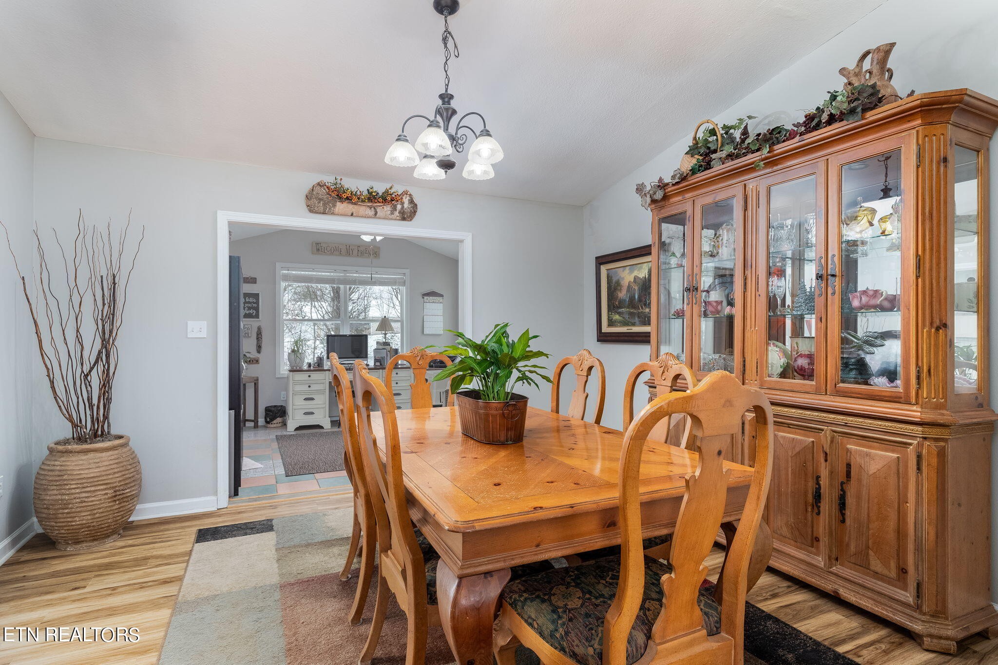 5316 Shipe Road Corryton, TN 37721 - Photo 12 of 36 a dining room with furniture a livingroom and chandelier