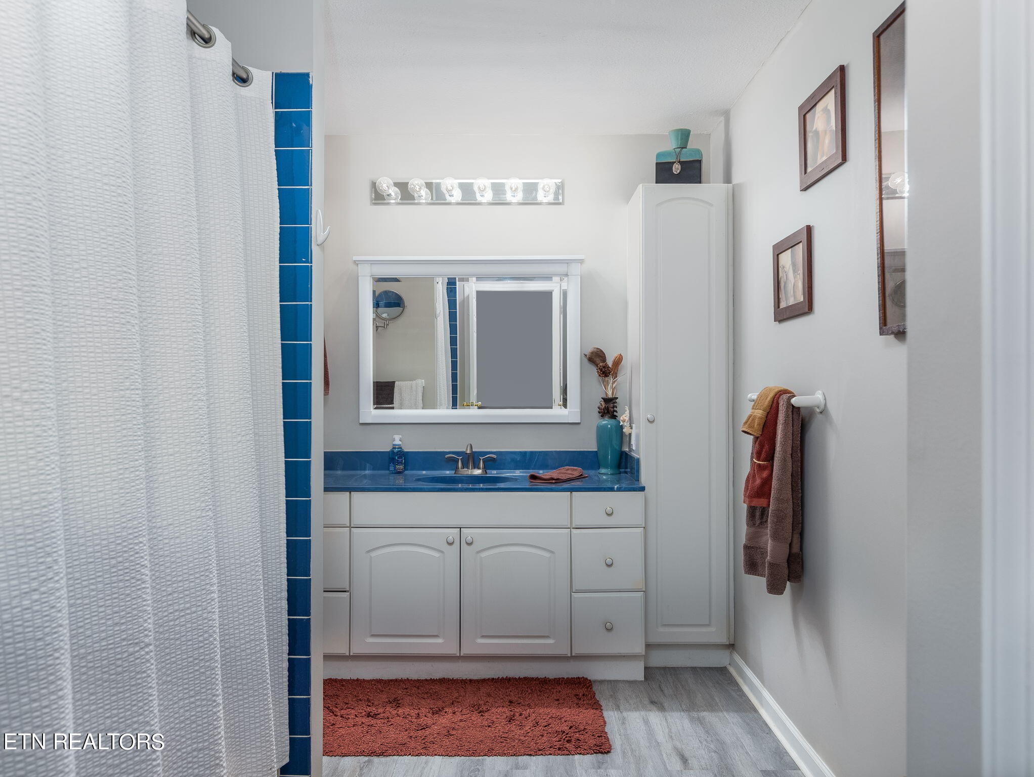 5316 Shipe Road Corryton, TN 37721 - Photo 25 of 36 a bathroom with a double vanity sink and a mirror