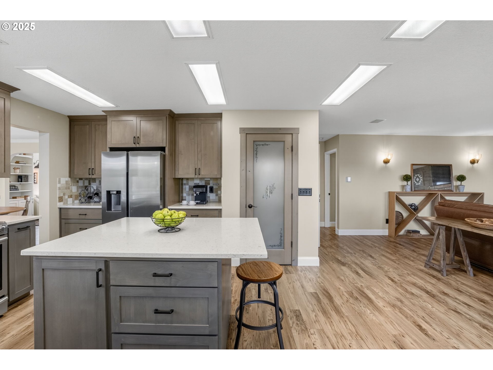 32102 Northwest Eagle Crest Drive Ridgefield, WA 98642 - Photo 16 of 48 a kitchen with a table and chairs in it