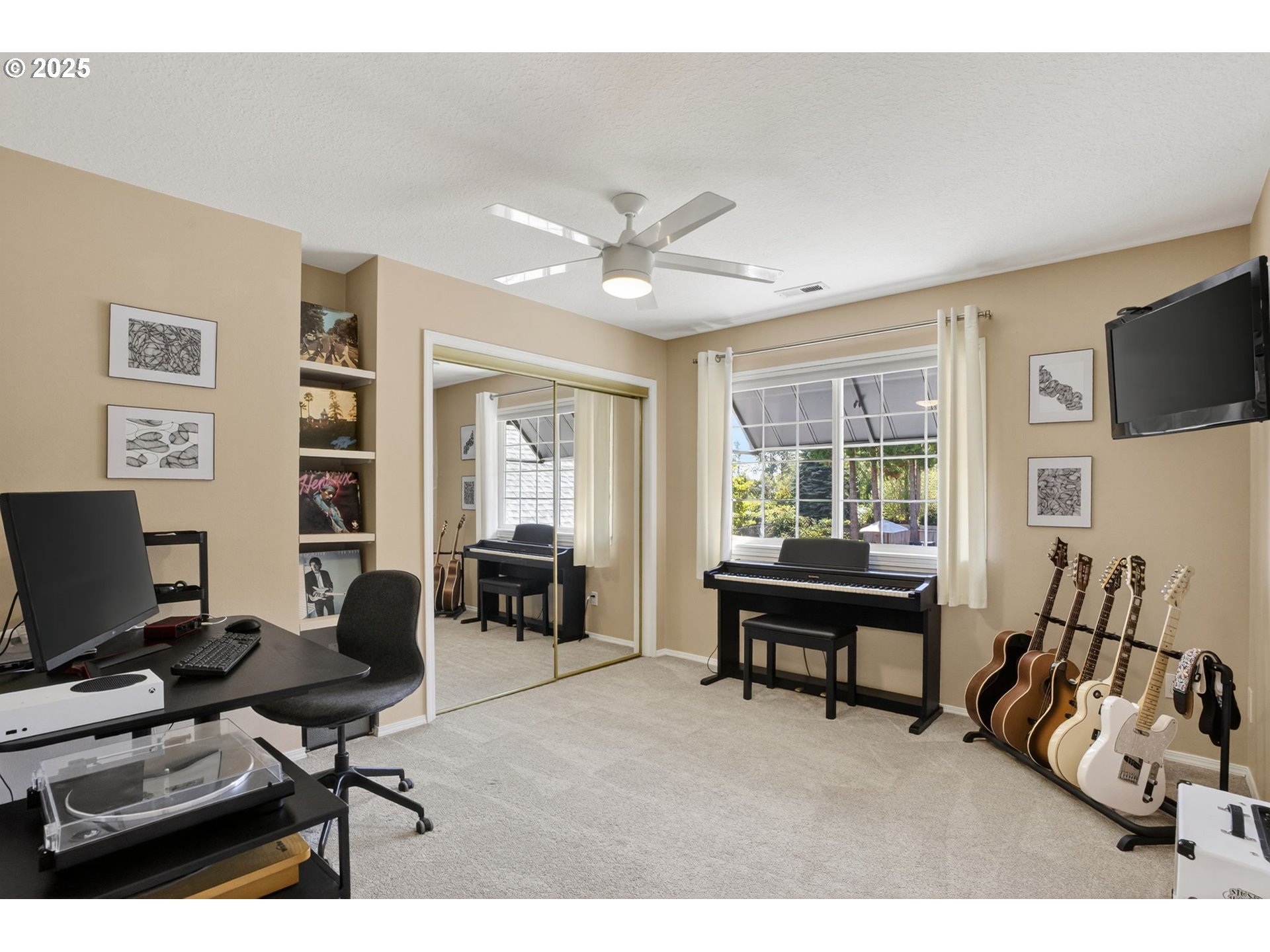 32102 Northwest Eagle Crest Drive Ridgefield, WA 98642 - Photo 28 of 48 a view of a livingroom with workspace and a window