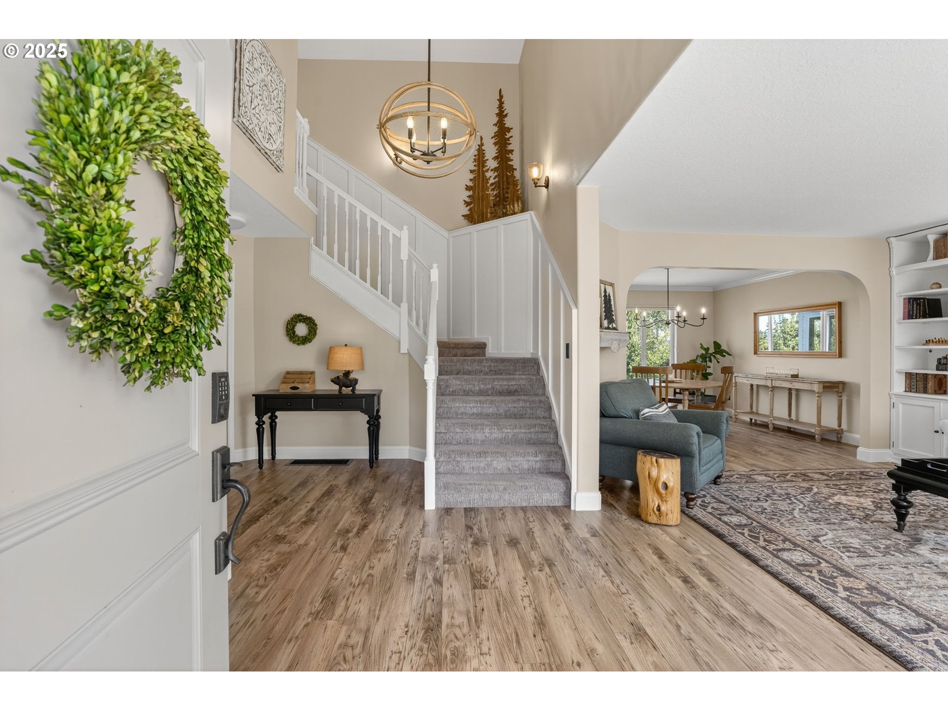 32102 Northwest Eagle Crest Drive Ridgefield, WA 98642 - Photo 4 of 48 a living room with furniture and a table