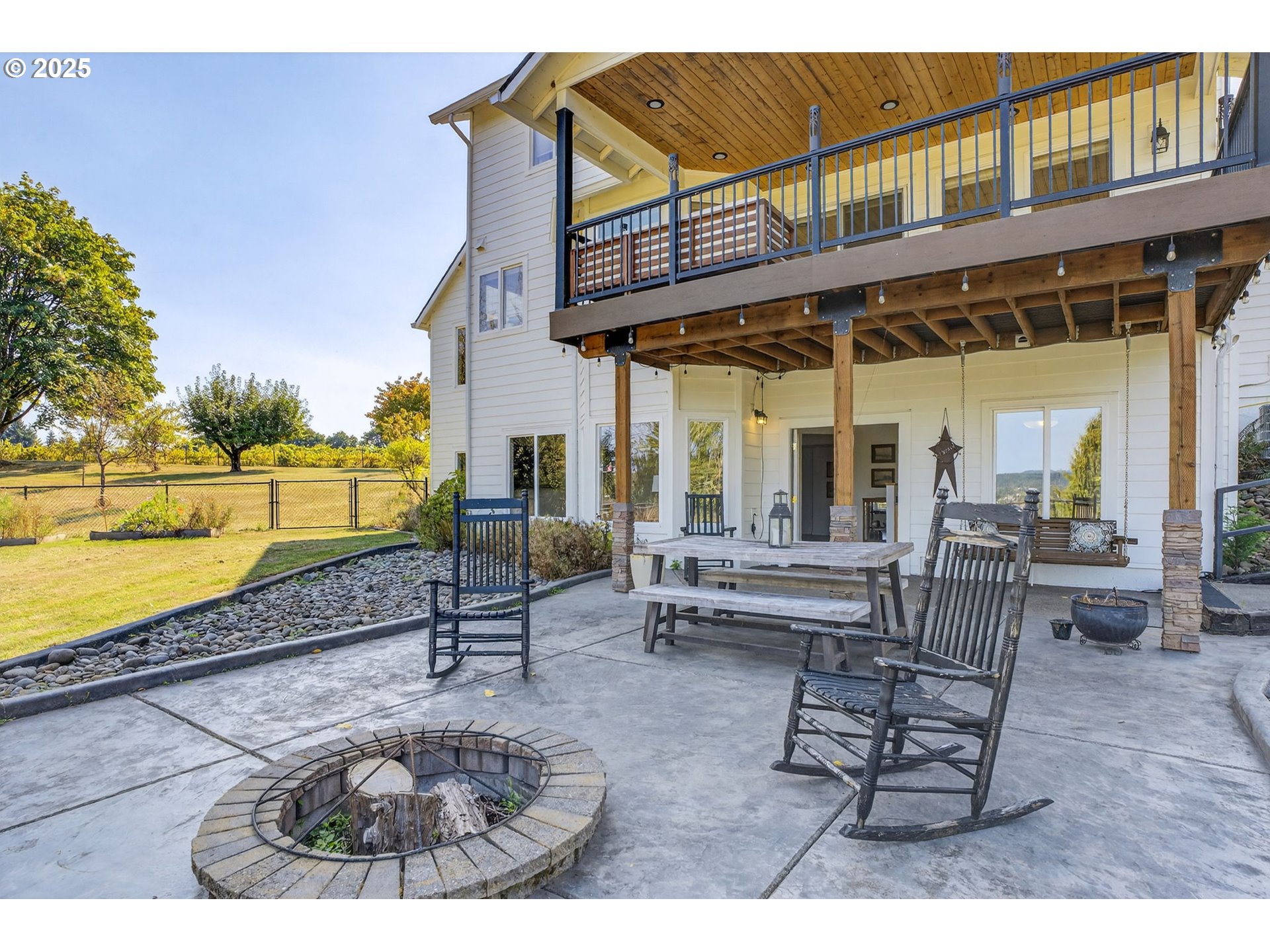32102 Northwest Eagle Crest Drive Ridgefield, WA 98642 - Photo 48 of 48 a building outdoor space with patio furniture
