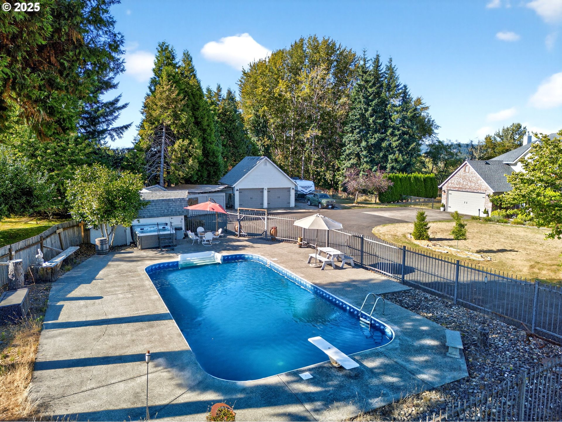 32102 Northwest Eagle Crest Drive Ridgefield, WA 98642 - Photo 6 of 48 a view of swimming pool with outdoor seating