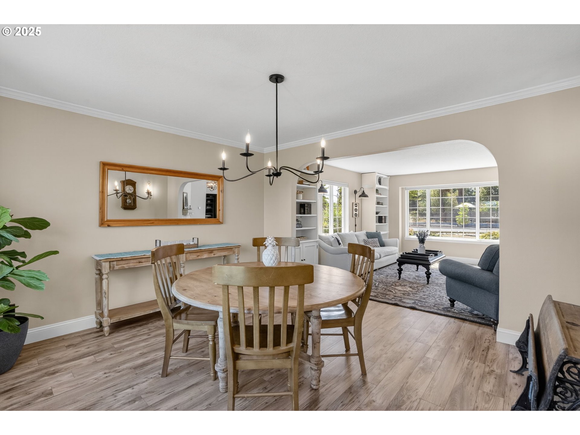 32102 Northwest Eagle Crest Drive Ridgefield, WA 98642 - Photo 10 of 48 a view of a dining room with furniture window and wooden floor