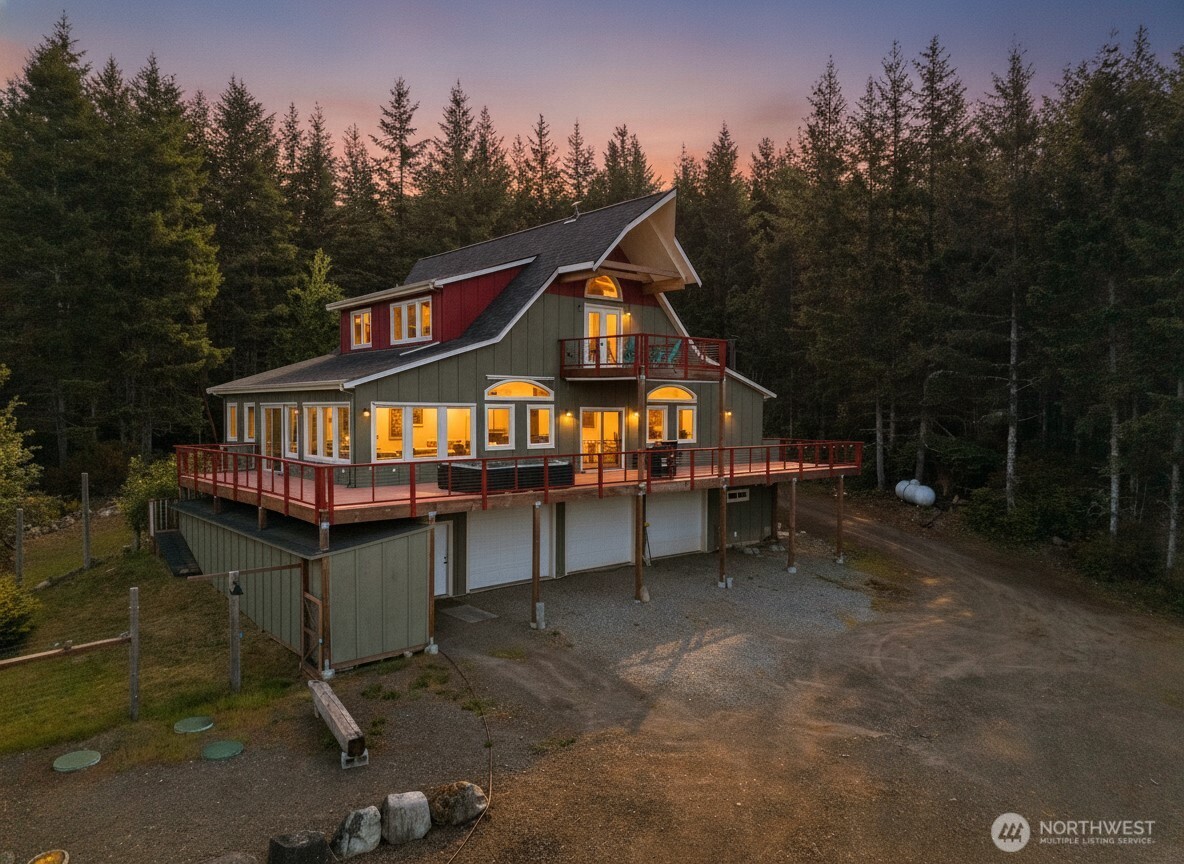83 Octopus Court Quilcene, WA 98376 - Photo 1 of 40 an outdoor space with swimming pool and furniture