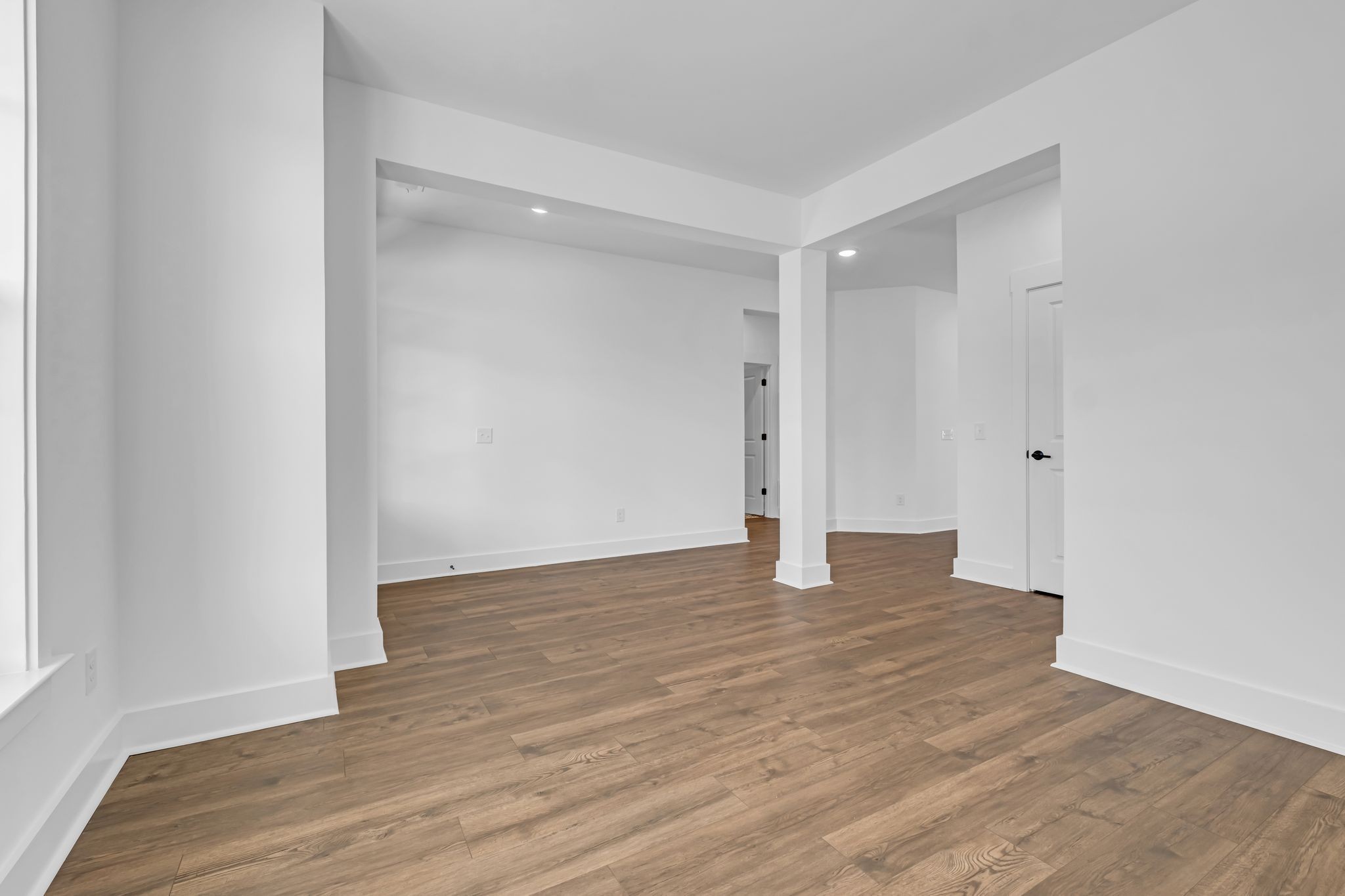 1102 Callaway Drive Lebanon, TN 37087 - Photo 11 of 30 a view of an empty room with wooden floor