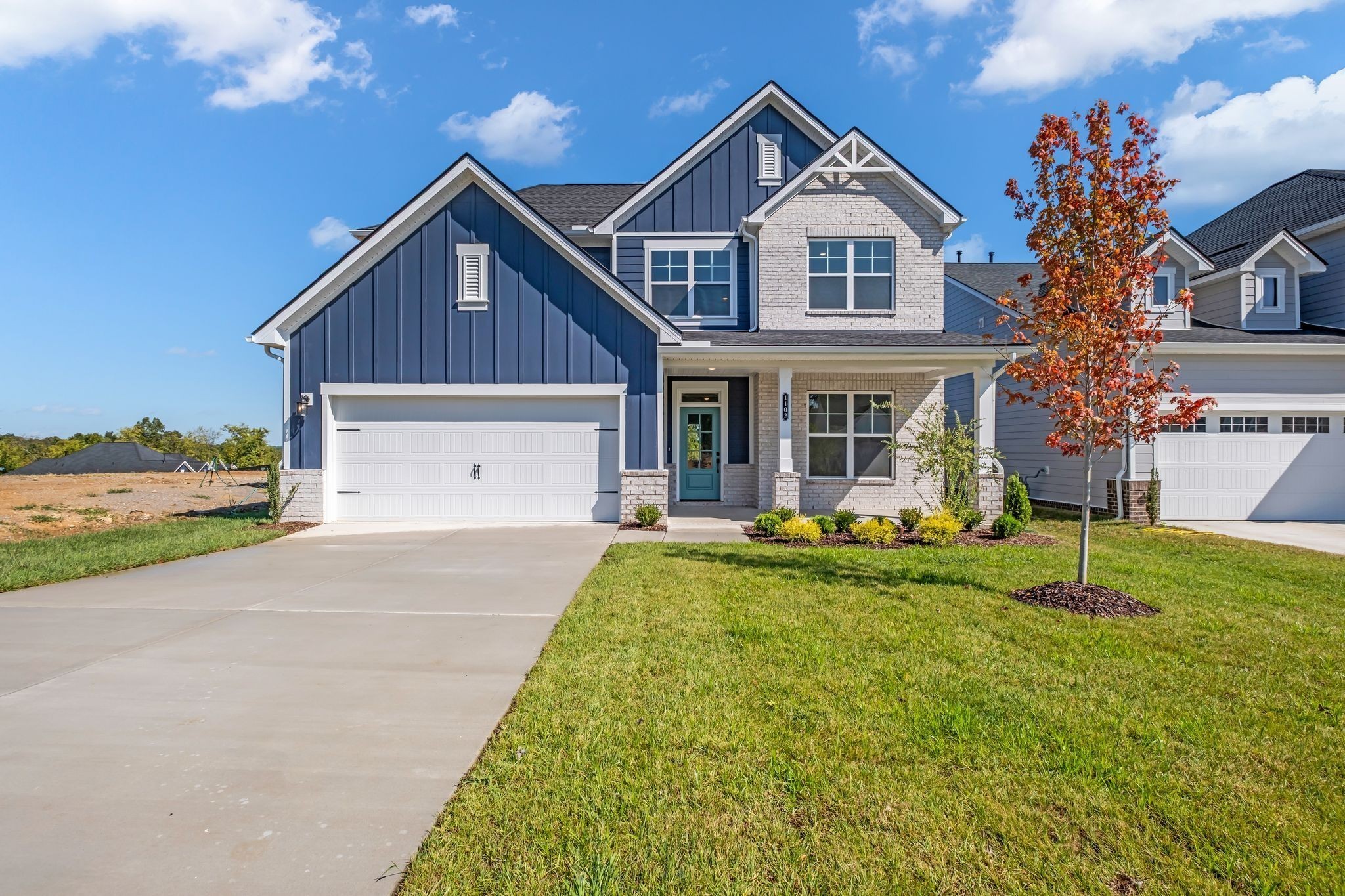 1102 Callaway Drive Lebanon, TN 37087 - Photo 3 of 30 a front view of a house with a yard and trees