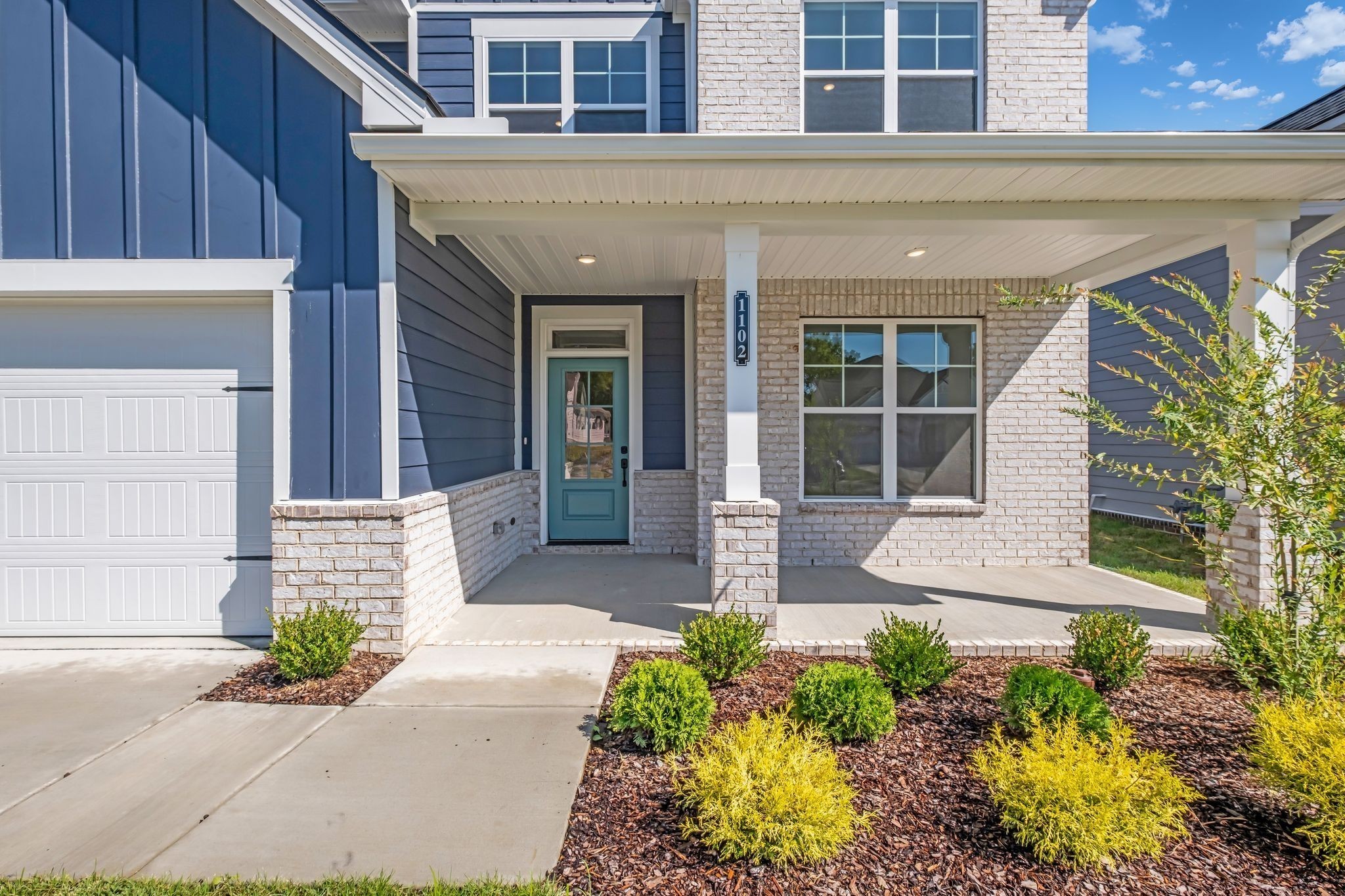 1102 Callaway Drive Lebanon, TN 37087 - Photo 7 of 30 a front view of a house with garden