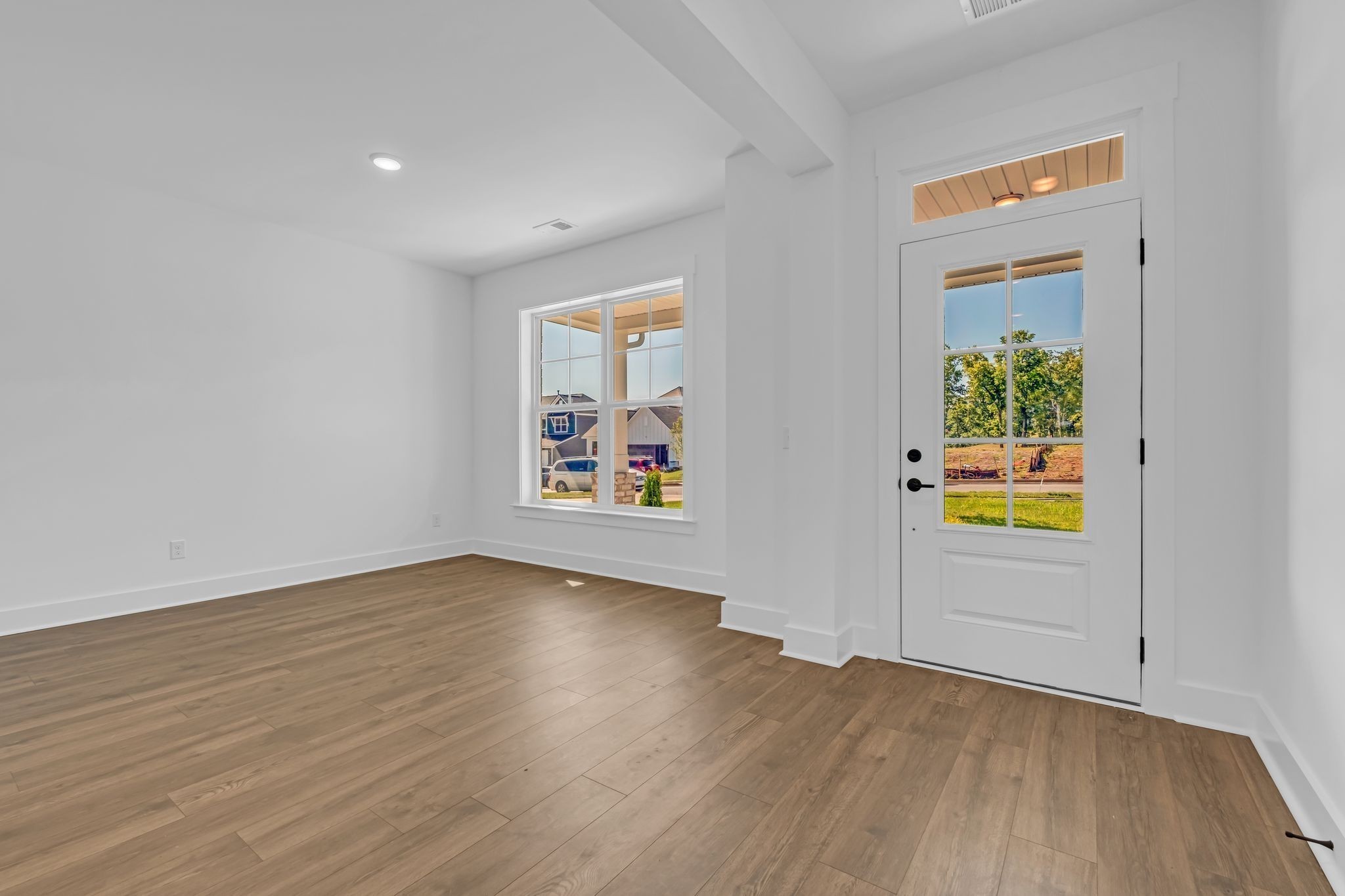 1102 Callaway Drive Lebanon, TN 37087 - Photo 9 of 30 wooden floor in an empty room with a window