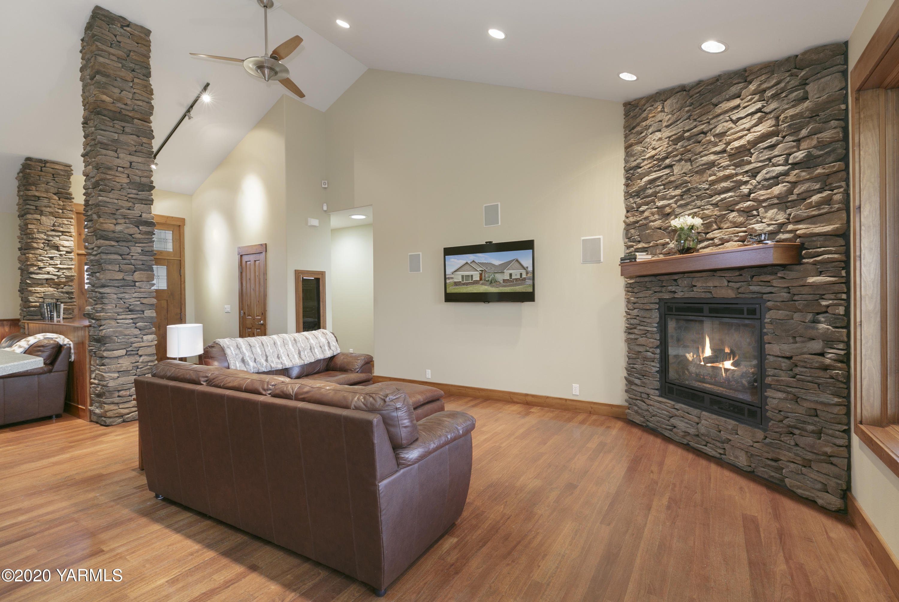 1800 Cook Road Yakima, WA 98908 - Photo 6 of 42 Great room fireplace matches rock col