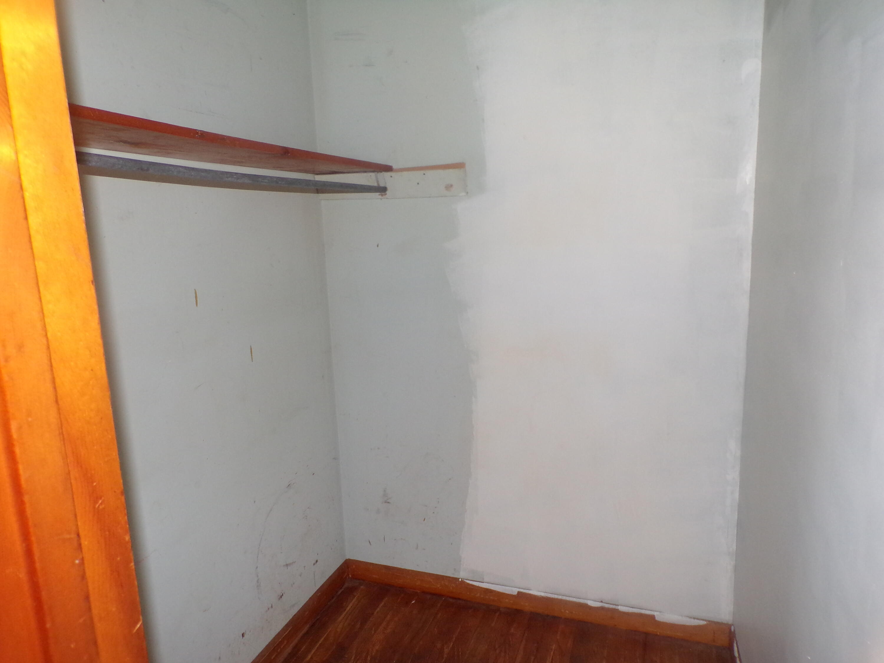 841 Mobley Street Thomson, GA 30824 - Photo 6 of 12 walk-in closet, hardwood floors