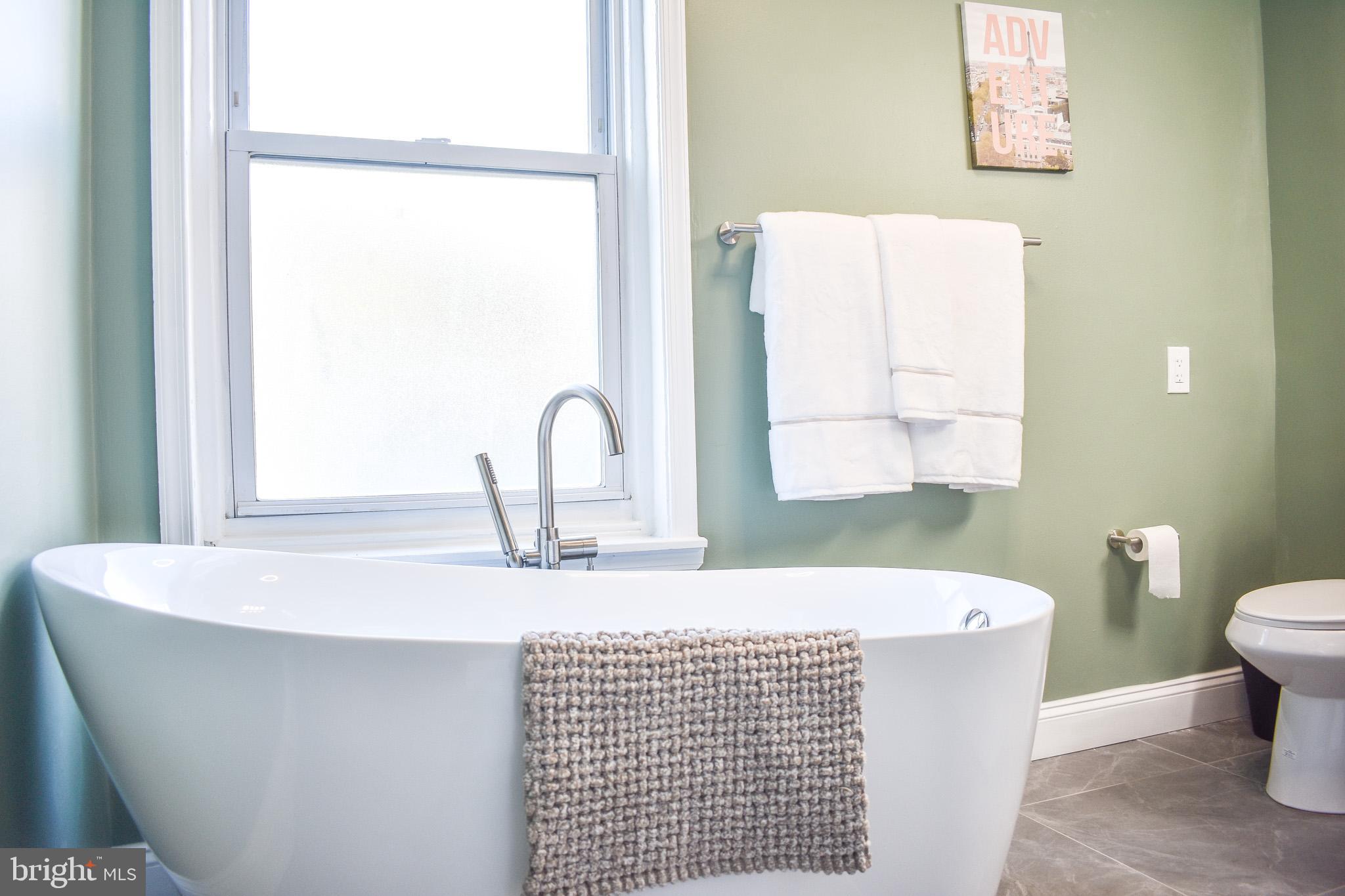 2703 Poplar Street Philadelphia, PA 19130 - Photo 12 of 21 a bathroom with a sink and a toilet