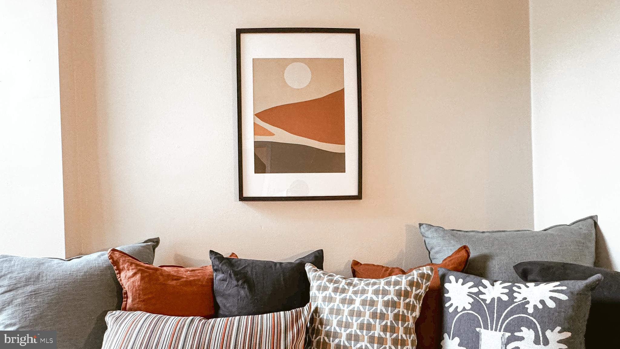 2703 Poplar Street Philadelphia, PA 19130 - Photo 13 of 21 a bedroom with a bed and wall painting