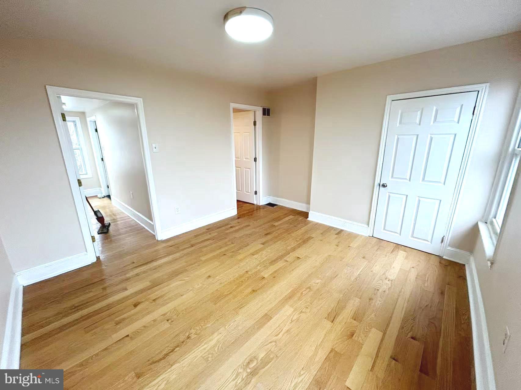 2703 Poplar Street Philadelphia, PA 19130 - Photo 18 of 21 a view of empty room with wooden floor
