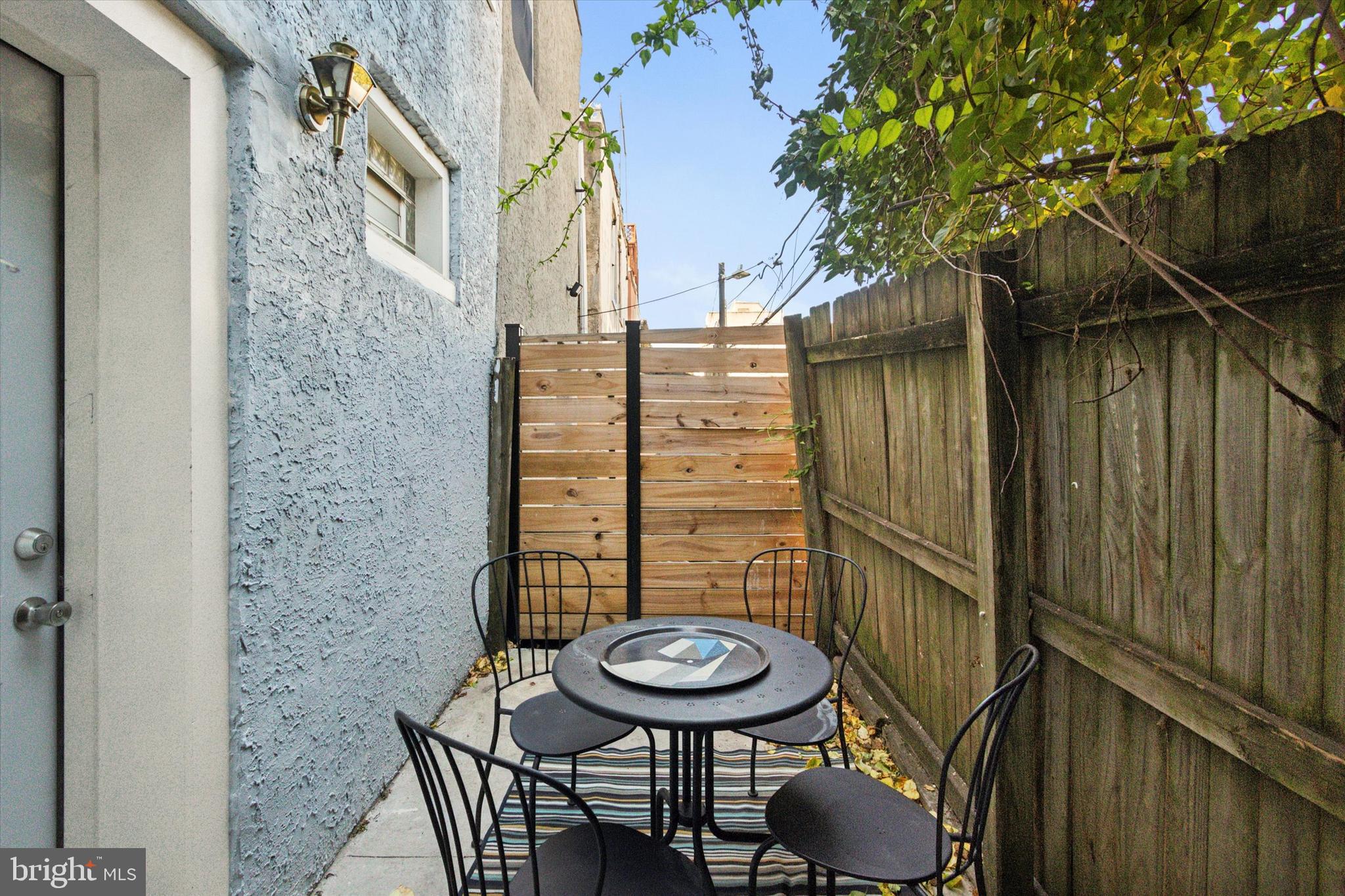 2703 Poplar Street Philadelphia, PA 19130 - Photo 8 of 21 a view of a balcony with chairs and a table