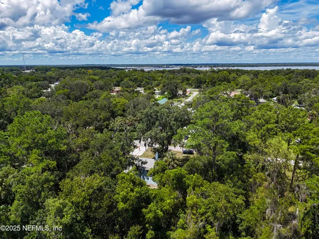 a view of city and green space