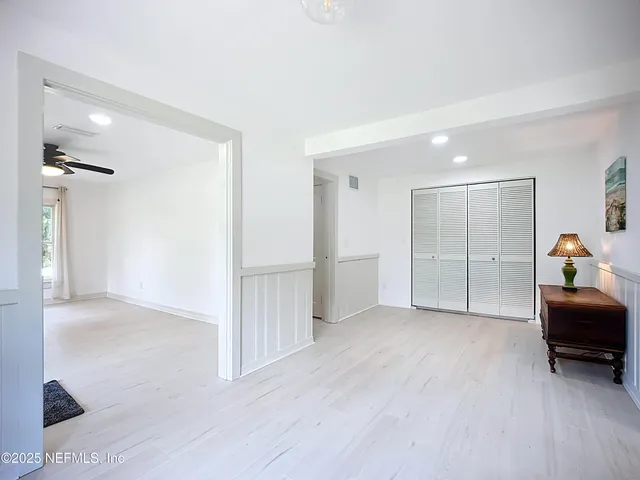 a view of livingroom with furniture and closet
