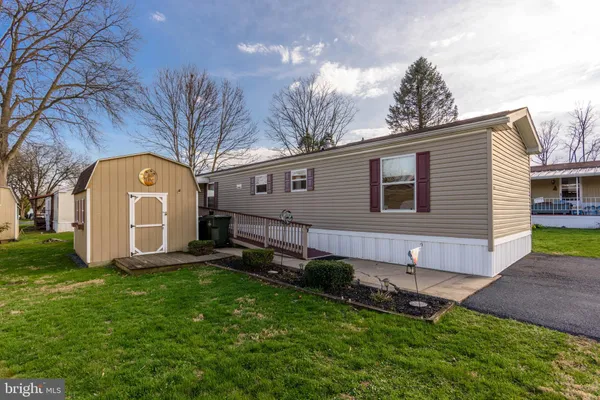 a view of a backyard with a garden