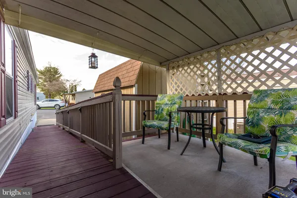 a view of a chairs on the roof deck