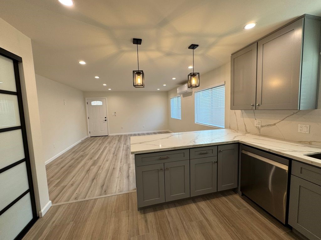 7149 Apperson Street, Unit 2 Tujunga, CA 91042 - Photo 3 of 12 a kitchen with a sink and wooden floor