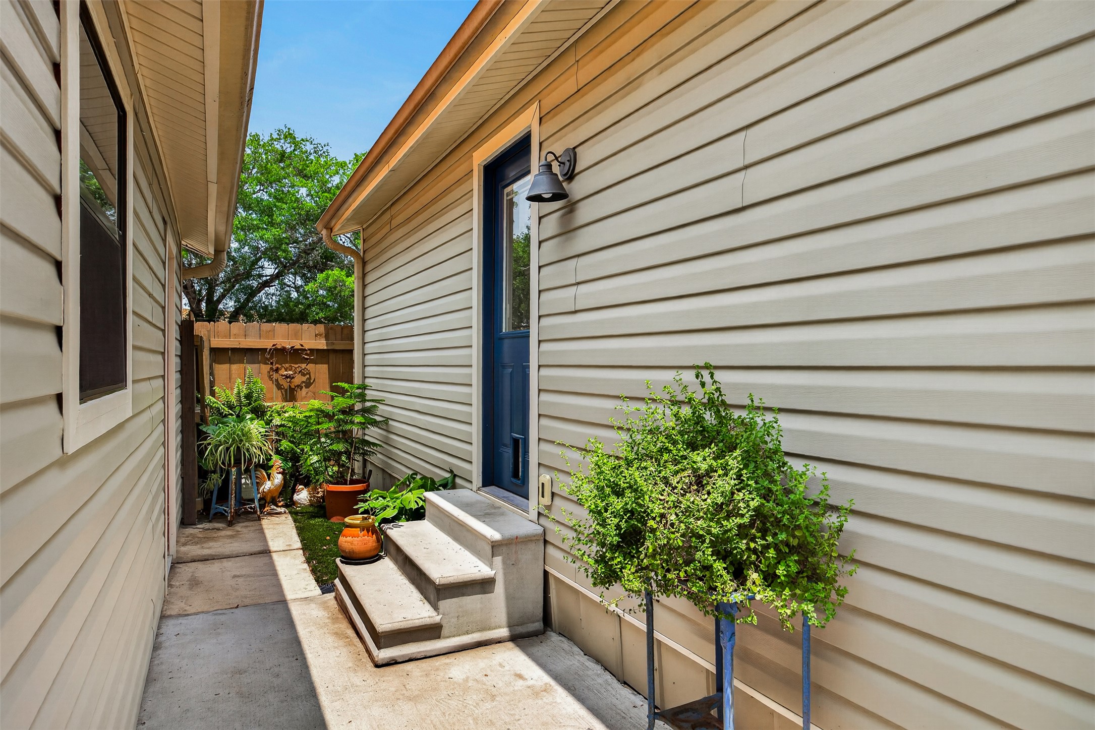217 Walnut Avenue Luling, TX 78648 - Photo 22 of 38 a house with a flower garden