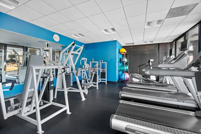 a view of a room with gym equipment