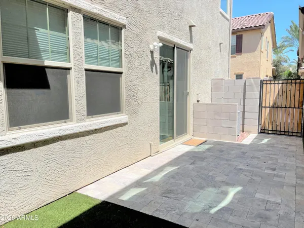 a view of backyard with a garden and plants