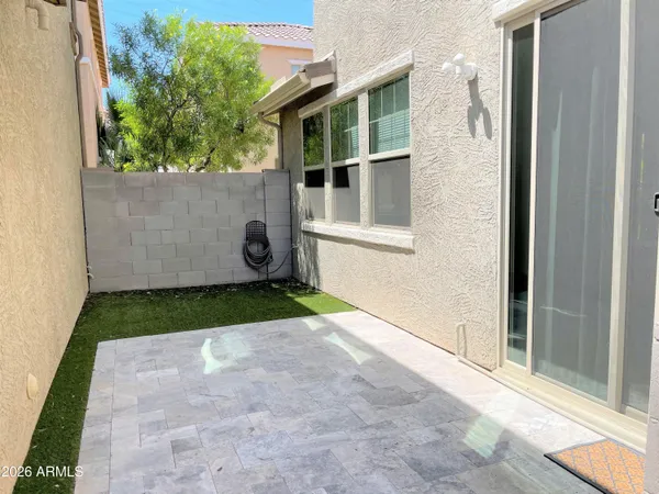 a house view with a outdoor space