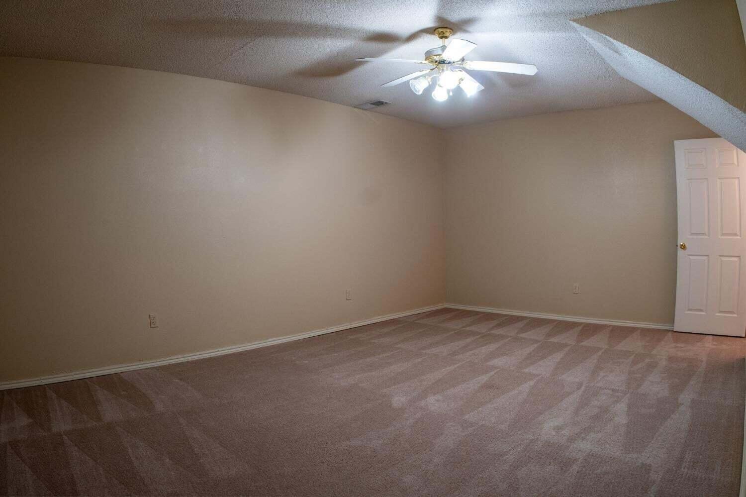 3417 97th Street Lubbock, TX 79423 - Photo 18 of 21 a view of an empty room