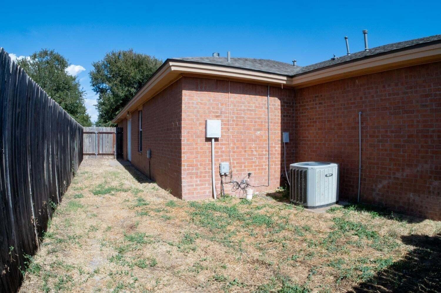 3417 97th Street Lubbock, TX 79423 - Photo 21 of 21 a backyard of a house
