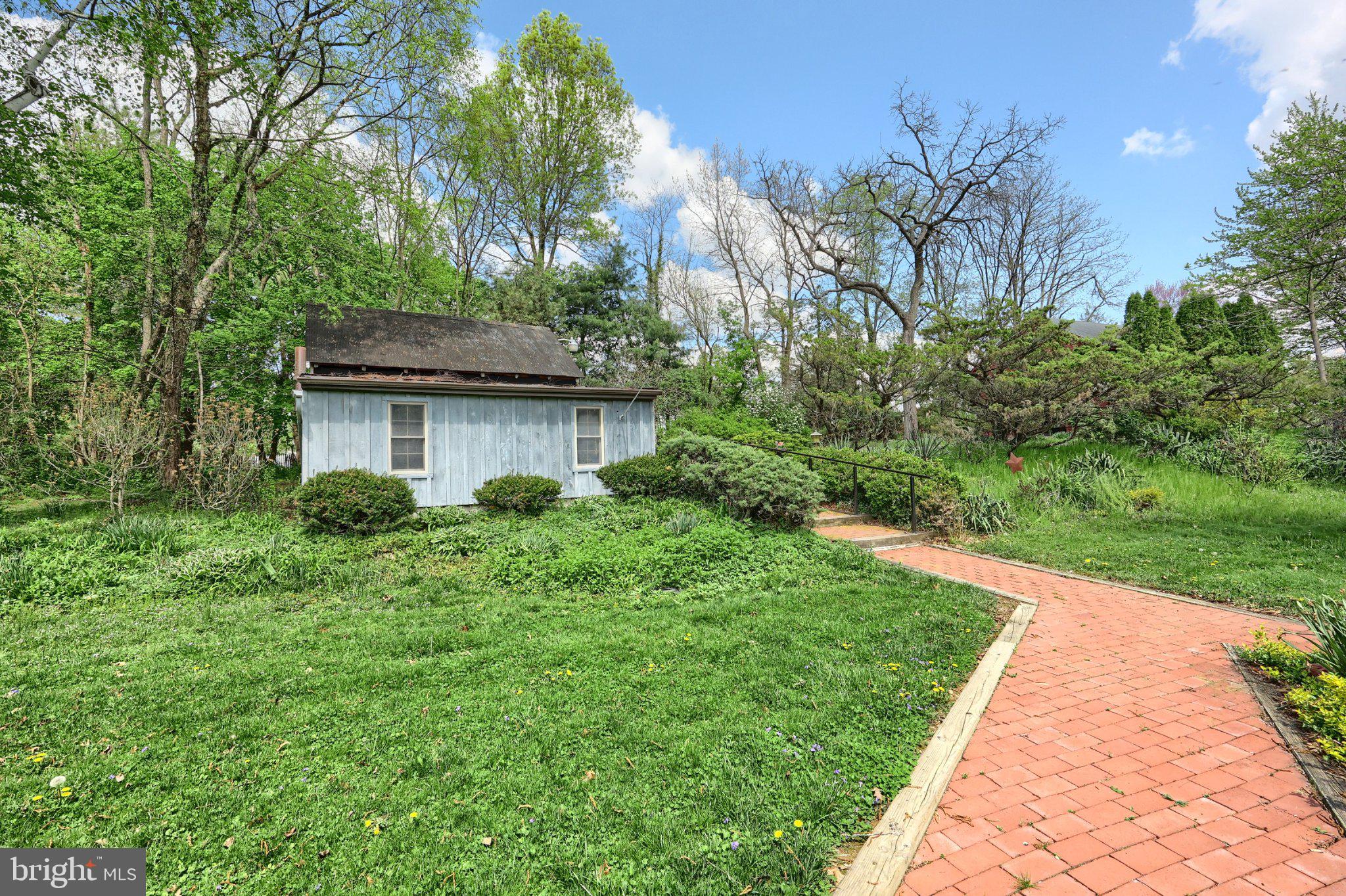 1974 Yingling Drive Spring Grove, PA 17362 - Photo 15 of 69 Charming cottage amid lush greenery.